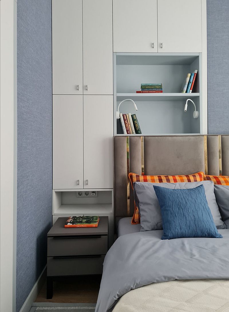 Встроенная мебель в небольшой комнате, уютная спальня в голубом цвете
